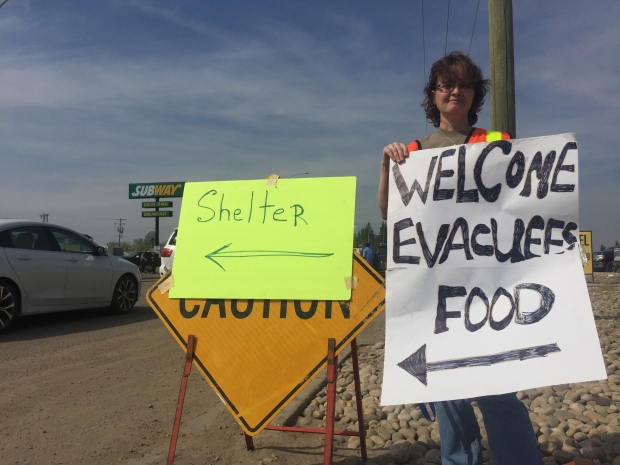 Rowann Baldry directs Fort McMurray evacuees to shelter in Grassland. 