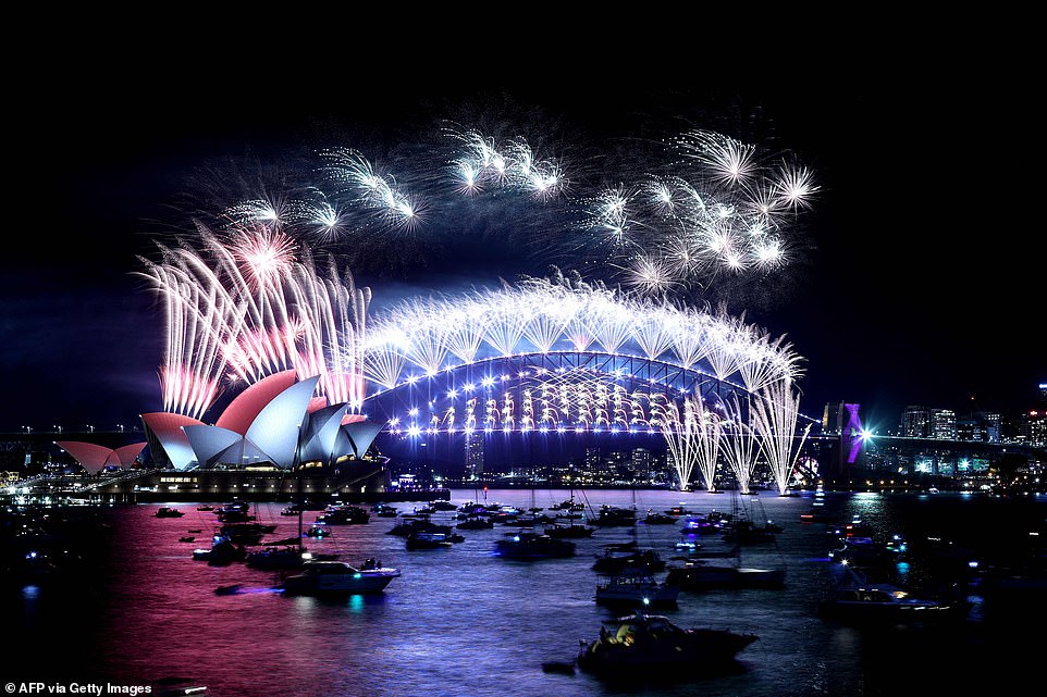 AUSTRALIA: New Year's Eve fireworks erupt over Sydney's iconic Harbour Bridge and Opera House on the stroke of midnight to mark the arrival of 2022