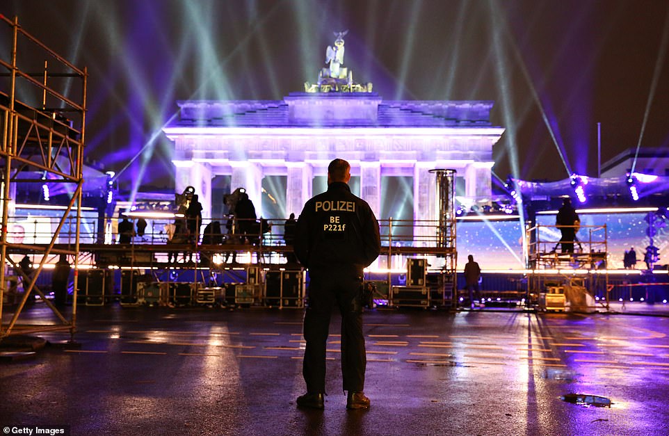 Police patrolled the area to ensure that no unauthorised people accessed the Brandenburg gate which was closed to the public due to Covid-19