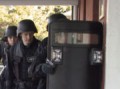 180px-Military_swat_team~0.jpg